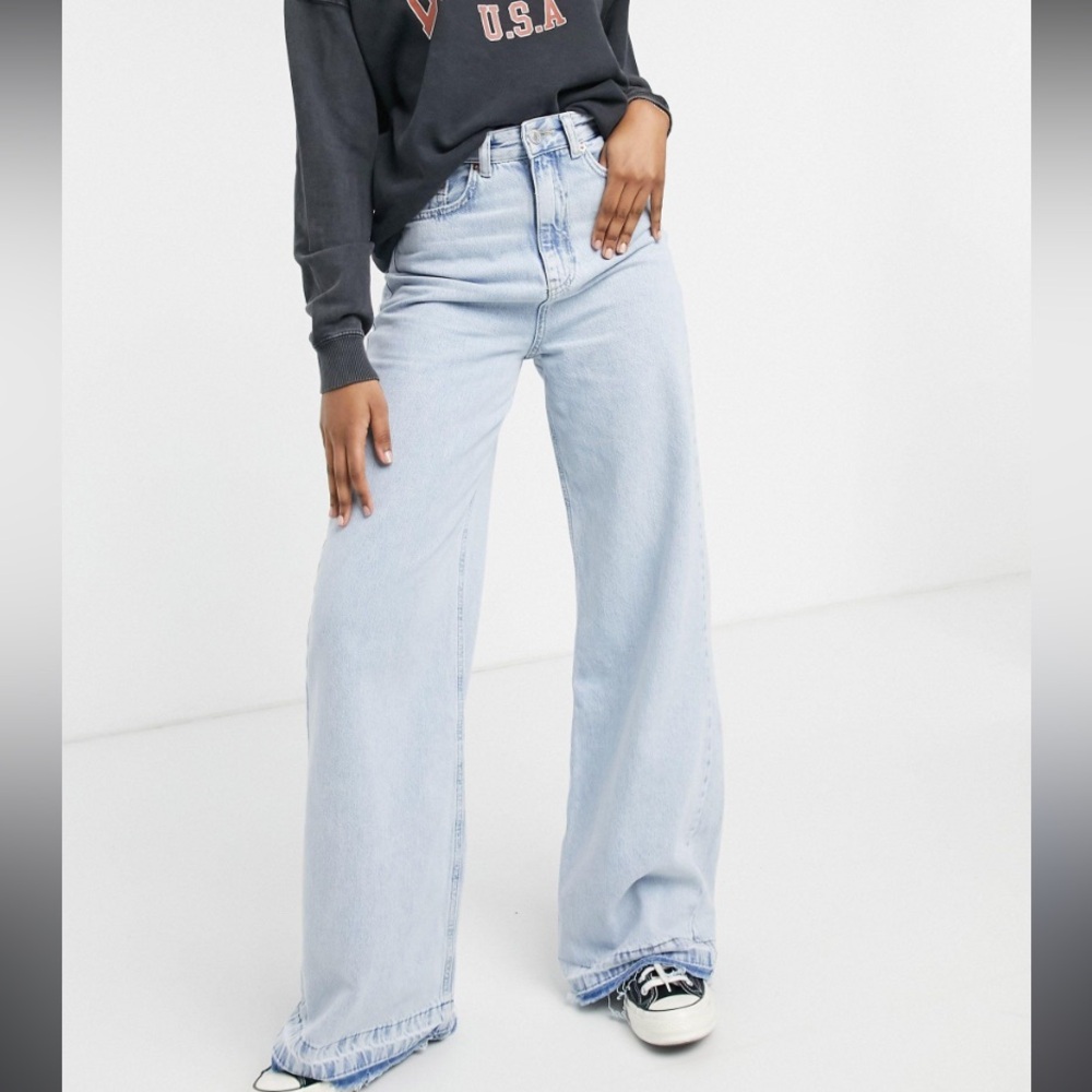 90s style Super wide high waisted light washed blue distressed denim jeans